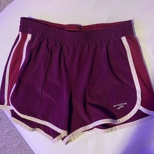 Brooks running shorts.